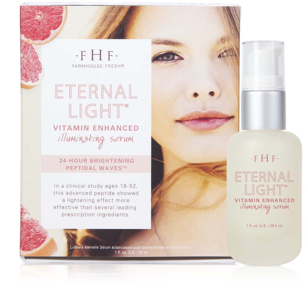 A box and a bottle of FarmHouse Fresh Eternal Light Illuminating Face Serum with vitamin C that is perfect for oily and combination skin prone to discoloration and dullness.