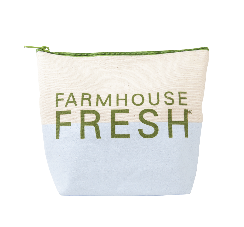 The front side of the signature Farmhouse Fresh Canvas Cosmetic Bag with logo.