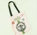 A Farmhouse Fresh® Gifting Tote with Goat Print and Patches adorned with an adorable image of a goat.