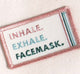 A patch that says Inhale, Exhale, Facemask, which comes on a FarmHouse Fresh® Gifting Tote.