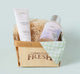 FarmHouse Fresh Fluffy Bunny Harvest Gift Basket that includes a hand cream and a body wash.