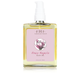 A bottle of Farmhouse Fresh Honey-Magnolia body oil that can be used in bath water or applied directly to skin.