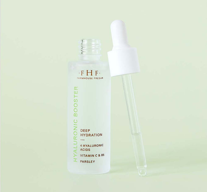 A bottle with pipette of FarmHouse Fresh Hyaluronic Booster that moisturizes and hydrates skin