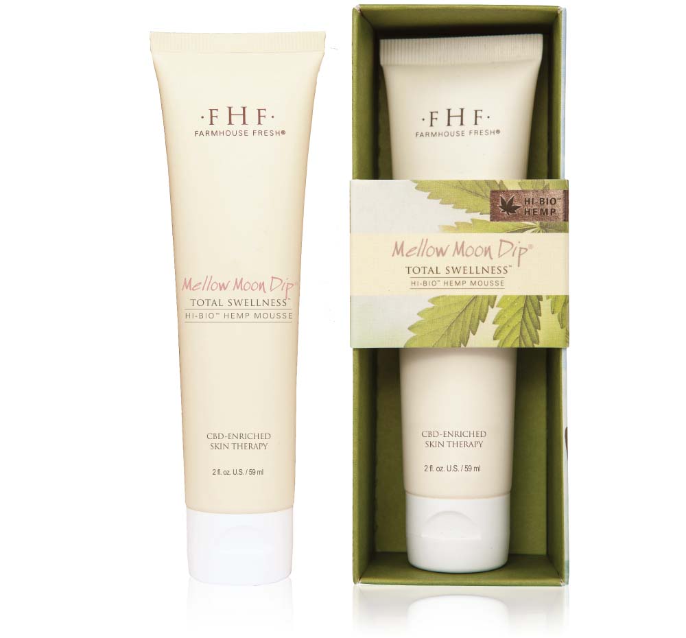 A tube and a box of Mellow Moon travel-friendly hand cram by FarmHouse Fresh made with full spectrum hemp oil with CBD which soothes and brings a calmed, more youthful appearance to skin.