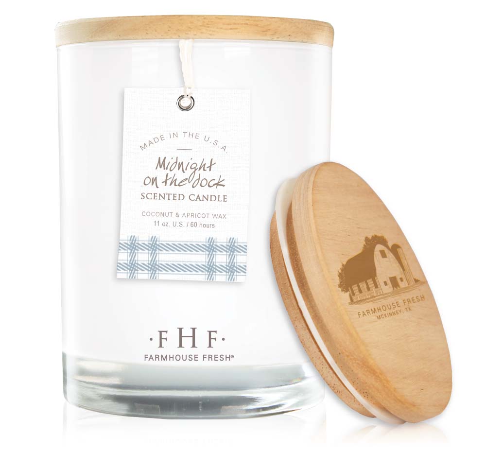 A Midnight on the Dock epicurean candle with a Farmhouse Fresh wooden lid that fills the room with delightful scent. Made with a coconut & apricot wax blend.