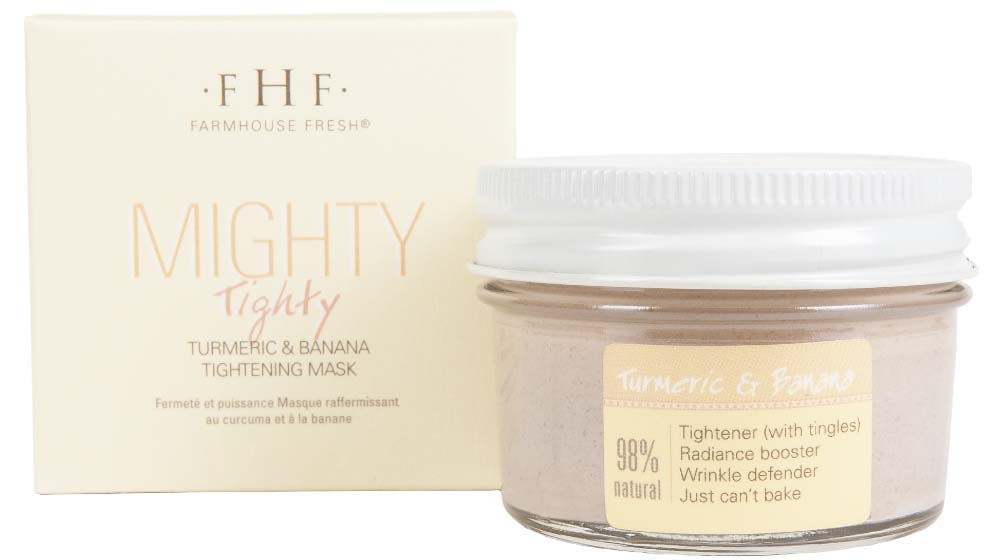 A box and a jar of Mighty Tighty Turmeric & Banana Mask by FarmHouse Fresh that tightens and improves skin texture.