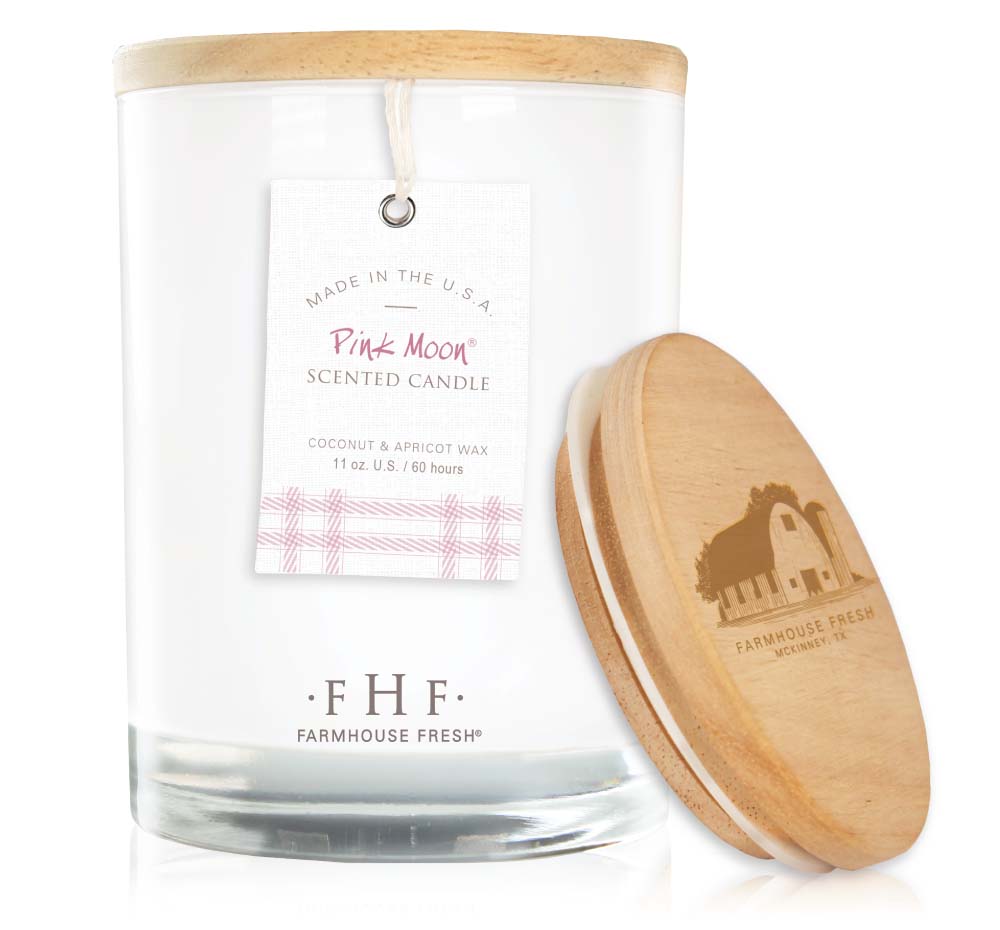 A FarmHouse Fresh Pink Moon all-natural candle, made with a coconut & apricot wax blend.