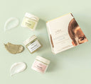 Three jars with skincare products from Porefectly Calm Instant Spa Facial by FarmHouse Fresh with a box next to them. Includes a face cleanser, purifying and calming face mask and a face moisturizer.