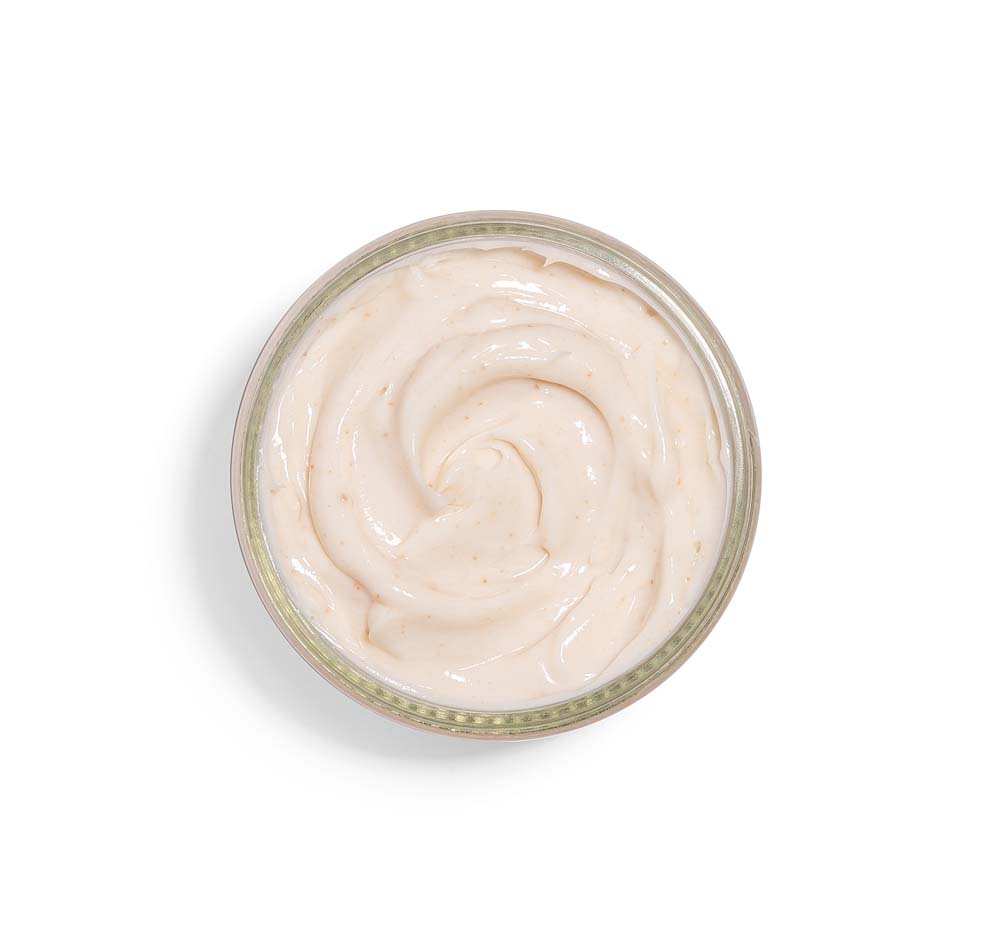 Top view of an opened jar of FarmHouse Fresh Pudding Apeel Face Mask for acneic, aging, dull and dry skin.