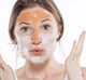 A woman with Splendid Dirt Nutrient Pumpkin Mud Mask on her face’s T-zone to pull excess oils and clean pores.