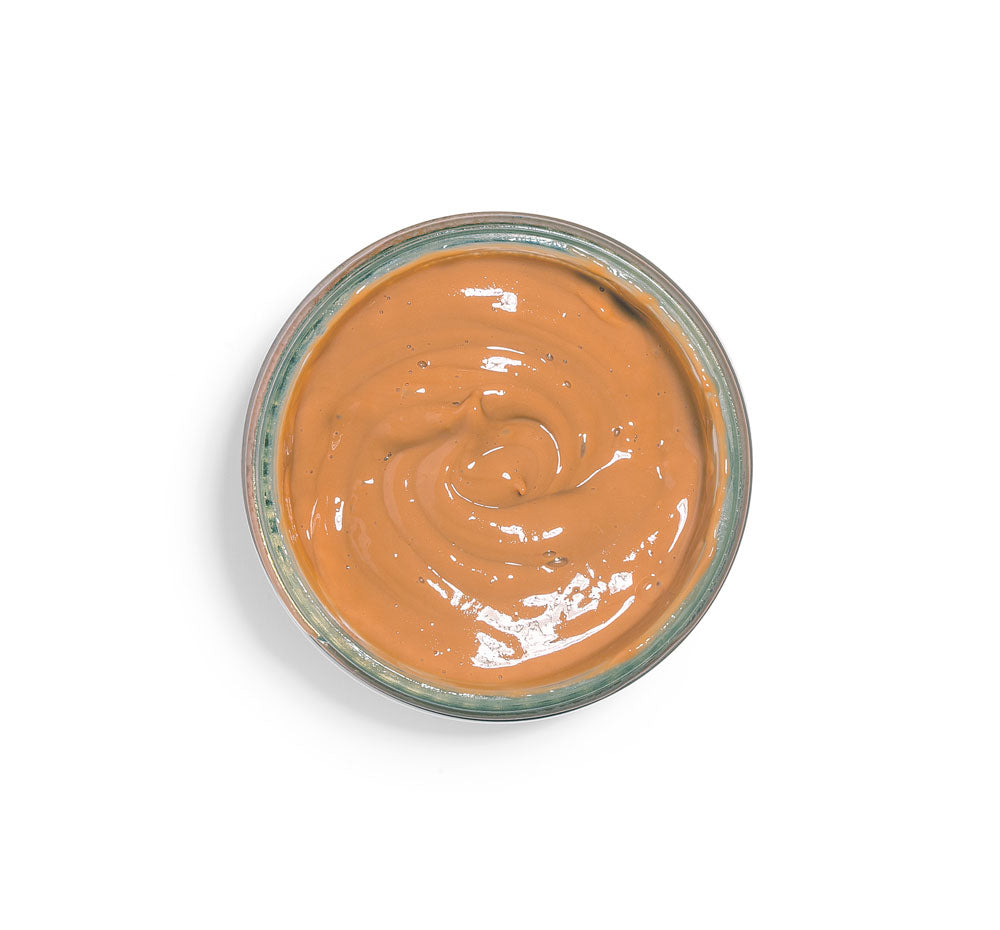 Top view of FarmHouse Fresh Splendid Dirt Face Mask with organic pumpkin puree that deep cleanses pores and improves the look of uneven skin tones.