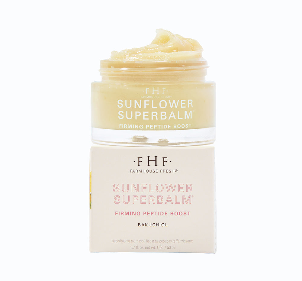 A jar and a box of FarmHouse Fresh Sunflower Superbalm Firming Peptide Boost face balm made with bakuchiol (a plant-based alternative to retinol).