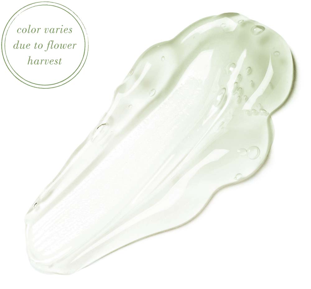 A swatch of FarmHouse Fresh Watercress Hydration Cascade Gelee Moisturizer showing its lightweight texture and beautiful color that changes due to flower harvest of natural ingredients.