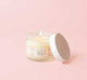 A travel-size Whoopie candle by Farmhouse Fresh made with all-natural blend of apricot and coconut wax.