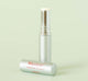 A metal tube of Whoopie Hydrating Lip Balm by Farmhouse Fresh, scented like a freshly baked cake.