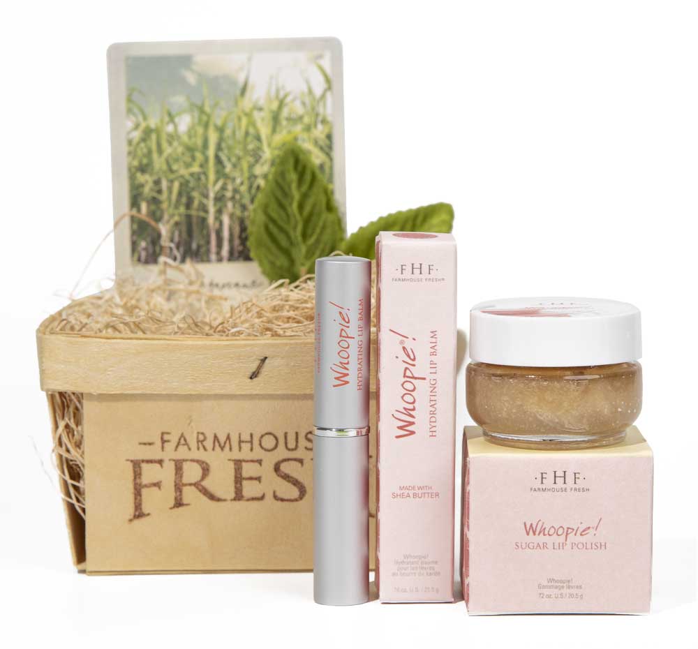 A Whoopie Lip Gift Basket by Farmhouse Fresh that comes in a ready-to-gift farm basket and contains a lip balm and a lip scrub.