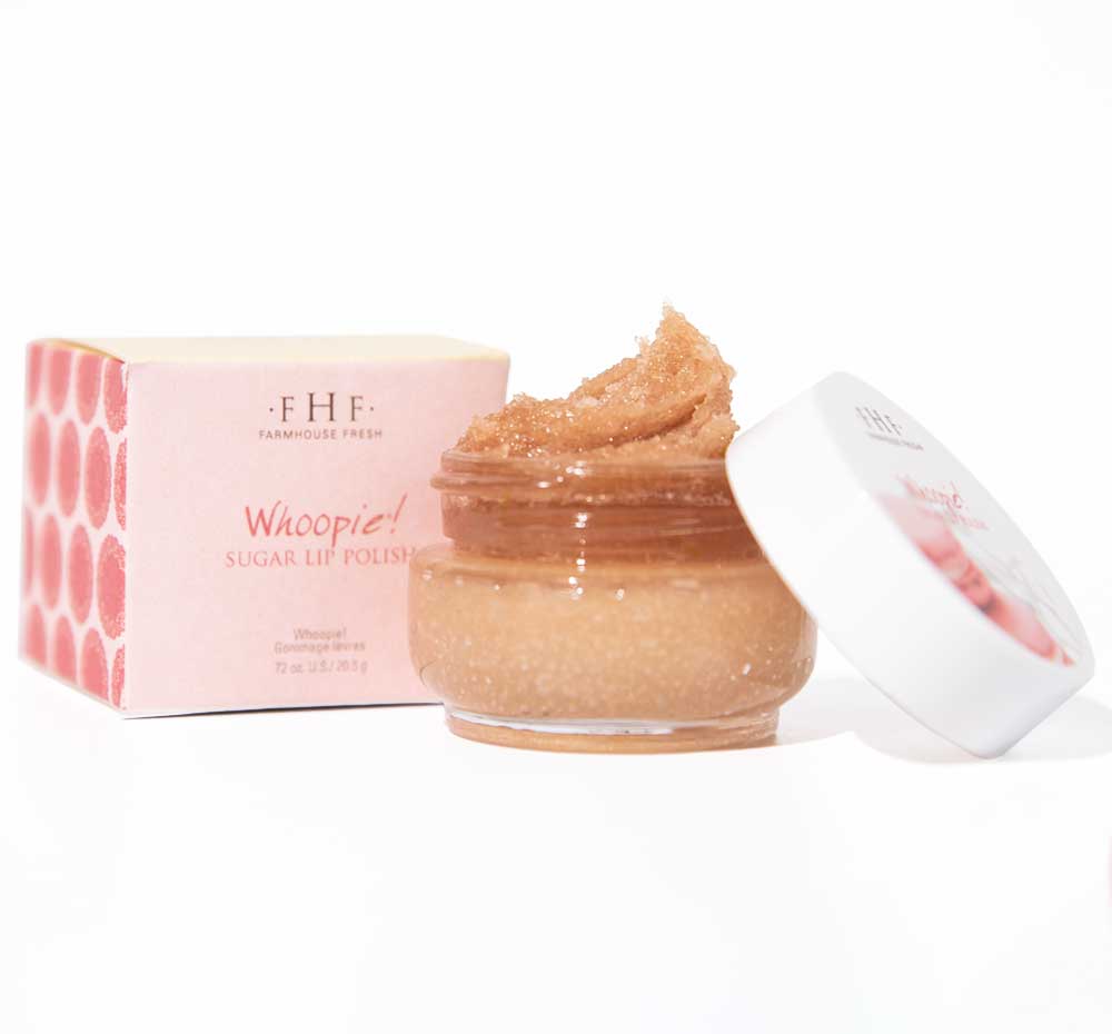 A jar of gentle, all-natural Whoopie Lip Polish by Farmhouse Fresh and a box next to it.