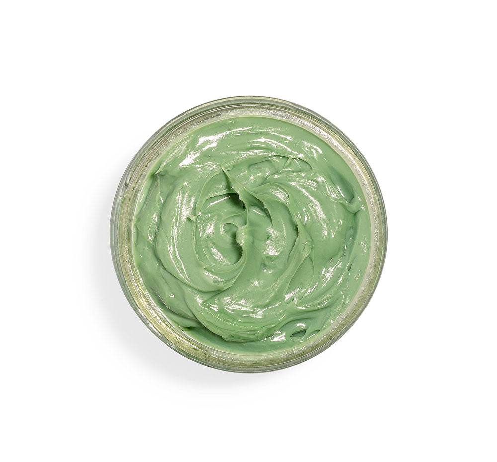 Top view of an opened jar of a hydrating Guac Star avocado face mask by Farmhouse Fresh.